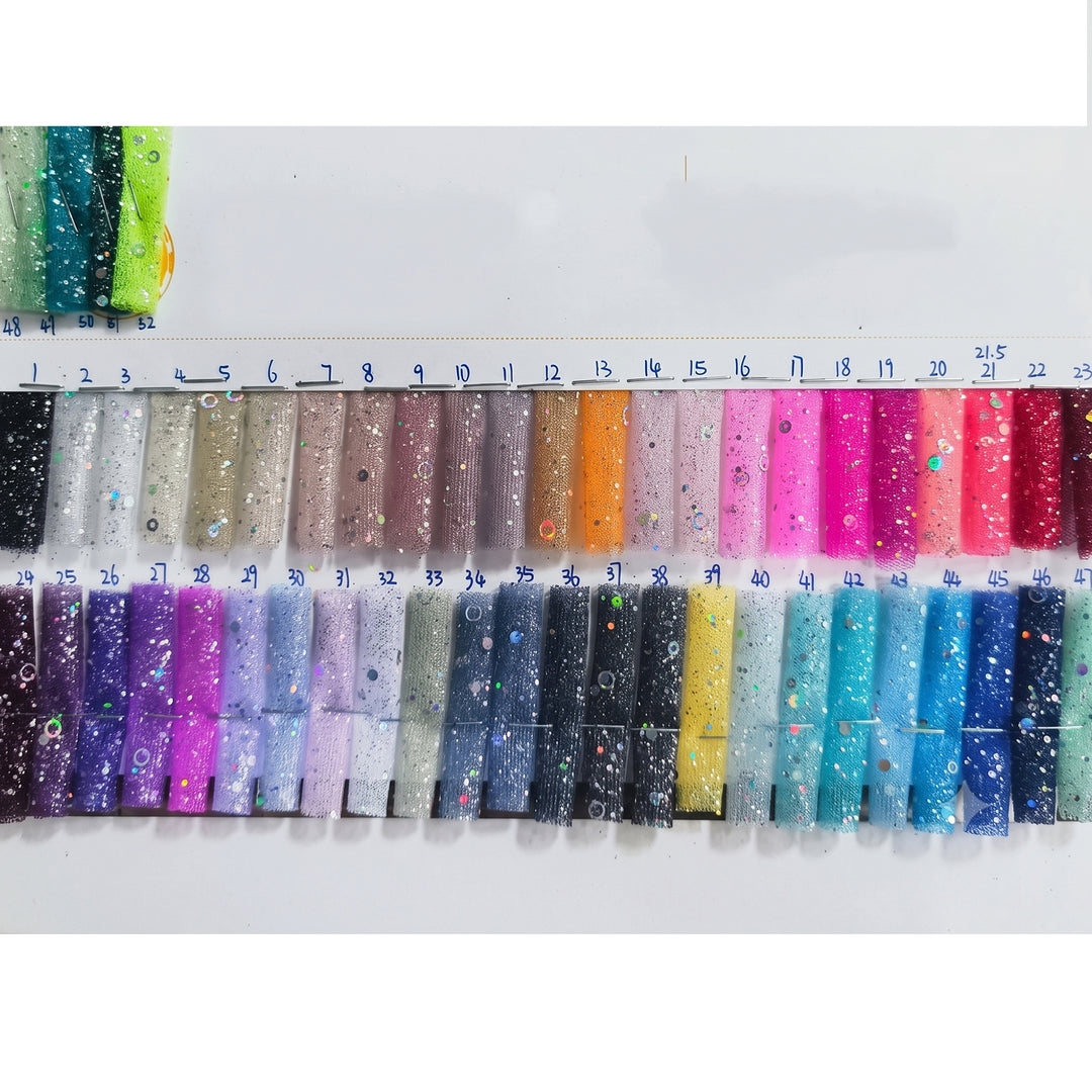 A large grid of small fabric swatches in many colors arranged on a white measurement chart with printed numbers. This is a Metis dress color-options reference image rather than a single product photo, so subject type is Color Swatch.