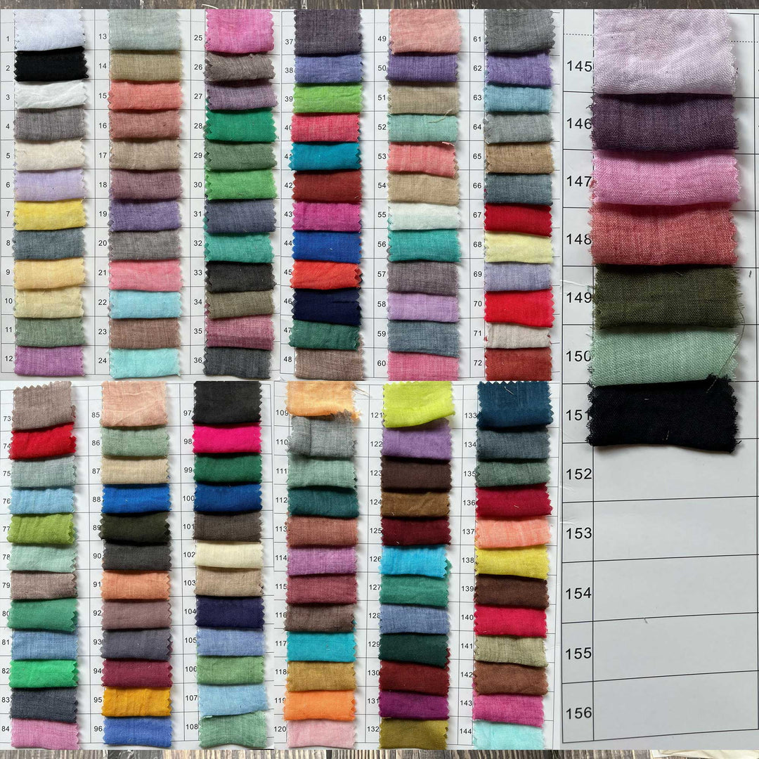 A large grid of small fabric swatches in many colors arranged on a white measurement chart with printed numbers. This is a Potnia dress color-options reference image rather than a single product photo, so subject type is Color Swatch.