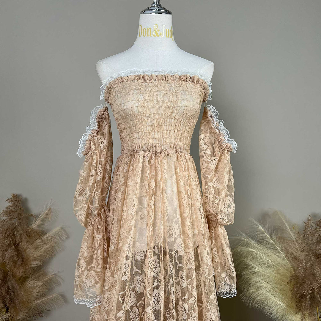 A khaki lace off-shoulder dress is displayed on a mannequin, featuring a shirred bodice, tiered ruffled sleeves, and rose patterns.